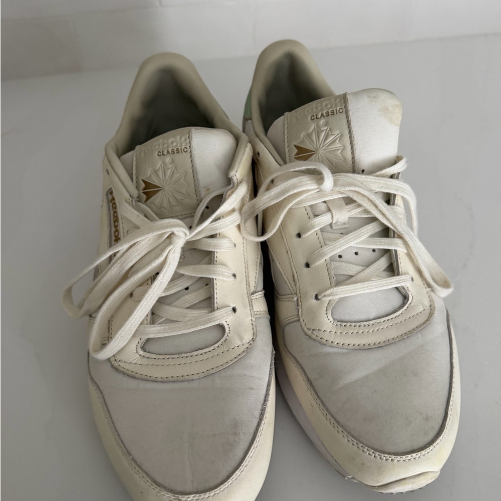 Reebok Cream Classic Leather Sneakers with Gold Accents
